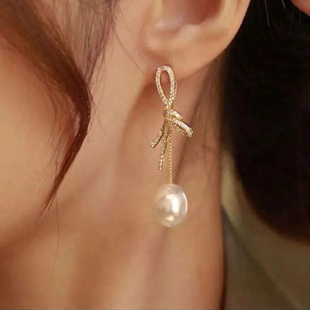 Bohemian bow earrings M40